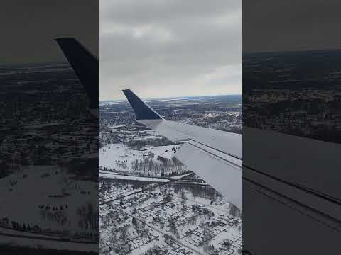 Airplane landing at DTW Airport in Detroit, Michigan. 